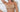 Woman relaxing in chair wearing Purty Body seamless nude Active Nipple Bra and thong with a confident, comfortable fit